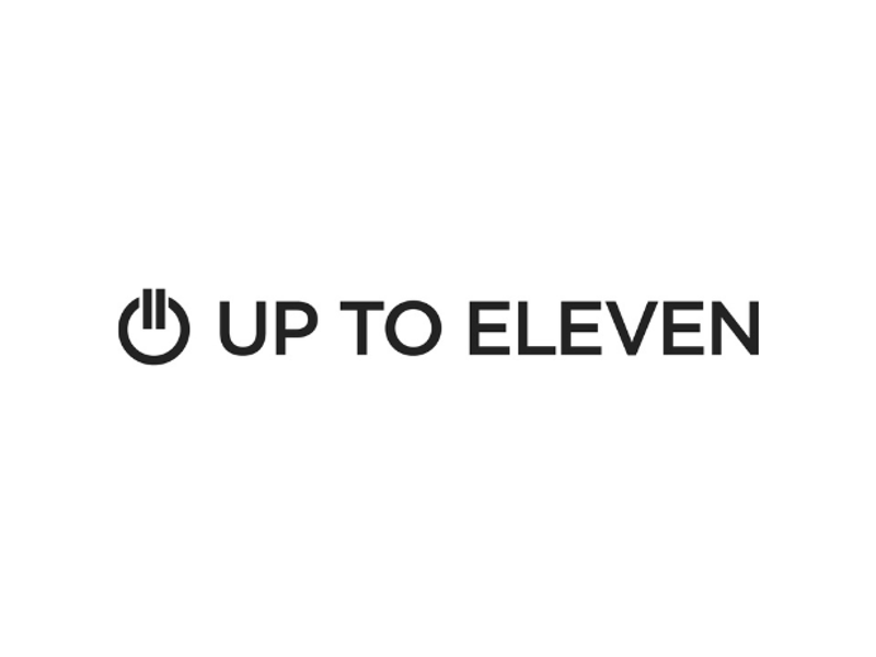 Logo Up to Eleven avec un symbole de bouton d'alimentation